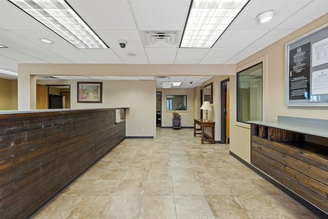 401 Main St, Blanco, TX 78606 - hallway featuring baseboards and a drop ceiling