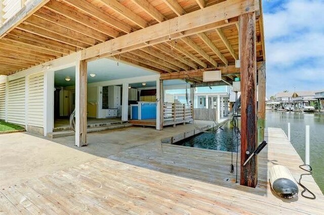 16525 Jamaica Cove Rd, Jamaica Beach, TX 77554 - dock area featuring a water view
