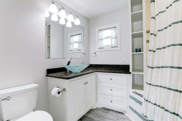 16525 Jamaica Cove Rd, Jamaica Beach, TX 77554 - bathroom with a shower with curtain, toilet, and vanity