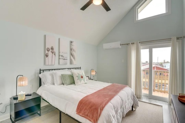 16525 Jamaica Cove Rd, Jamaica Beach, TX 77554 - bedroom with a wall unit AC, high vaulted ceiling, access to exterior, a ceiling fan, and wood finished floors
