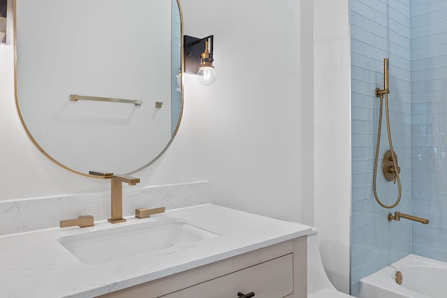 2450 Wickersham Ln Unit 2021, Austin, TX 78741 - bathroom with vanity, bathtub / shower combination, and toilet