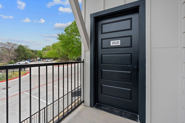 2450 Wickersham Ln Unit 2021, Austin, TX 78741 - doorway to property with a balcony