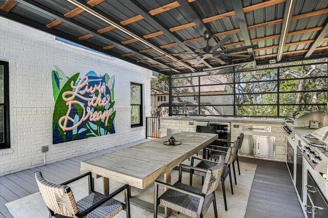 4500 Waterford Pl, Austin, TX 78731 - view of patio / terrace featuring an outdoor kitchen, outdoor dining space, ceiling fan, and wine cooler