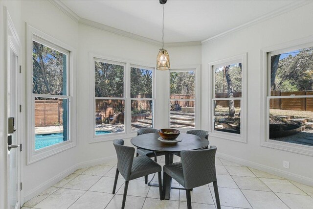 4500 Waterford Pl, Austin, TX 78731 - sunroom with healthy amount of natural light, tile patterned floors, and crown molding