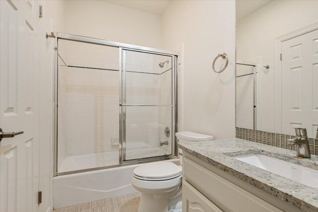 4500 Waterford Pl, Austin, TX 78731 - bathroom featuring vanity and shower / bath combination with glass door