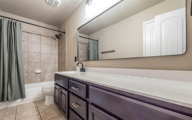 bathroom with shower / bath combo, visible vents, toilet, tile patterned floors, and vanity