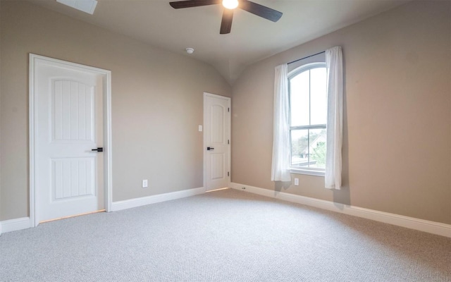 empty room with baseboards, carpet flooring, and ceiling fan