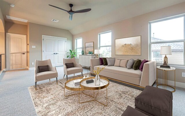 living area with vaulted ceiling, baseboards, carpet floors, ceiling fan, and visible vents
