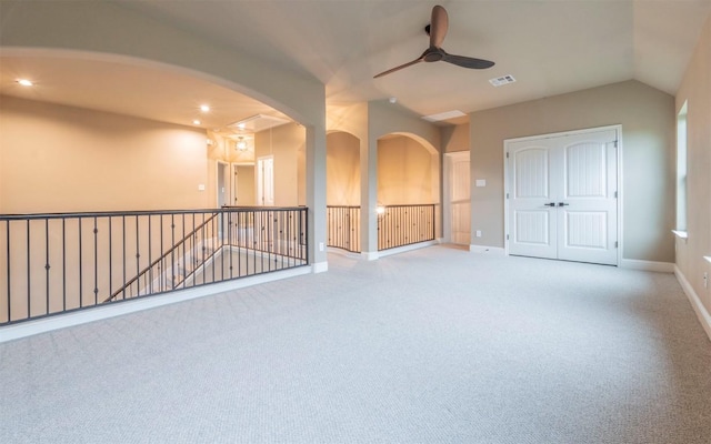 296 Elderberry Rd, Austin, TX 78737 - carpeted spare room with ceiling fan, arched walkways, recessed lighting, and vaulted ceiling