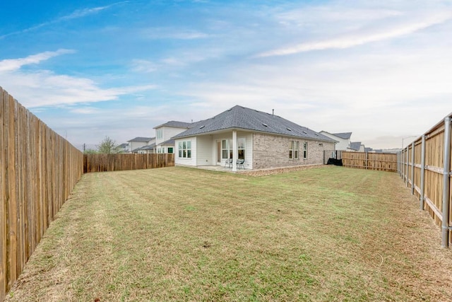 11808 Dillon Falls Dr, Austin, TX 78747 - rear view of house with a fenced backyard