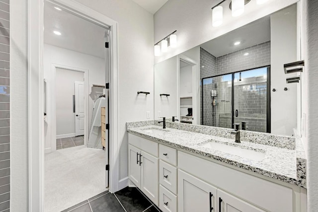 11808 Dillon Falls Dr, Austin, TX 78747 - bathroom with tile patterned flooring, double vanity, and a shower stall