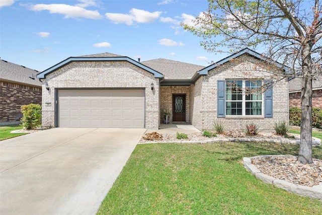231 Tradinghouse Creek St, Georgetown, TX 78633 - view of front of property with brick siding, an attached garage, concrete driveway, a front yard, and a shingled roof