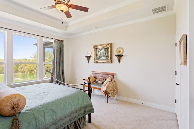 231 Tradinghouse Creek St, Georgetown, TX 78633 - bedroom featuring a raised ceiling, carpet flooring, ornamental molding, baseboards, and ceiling fan