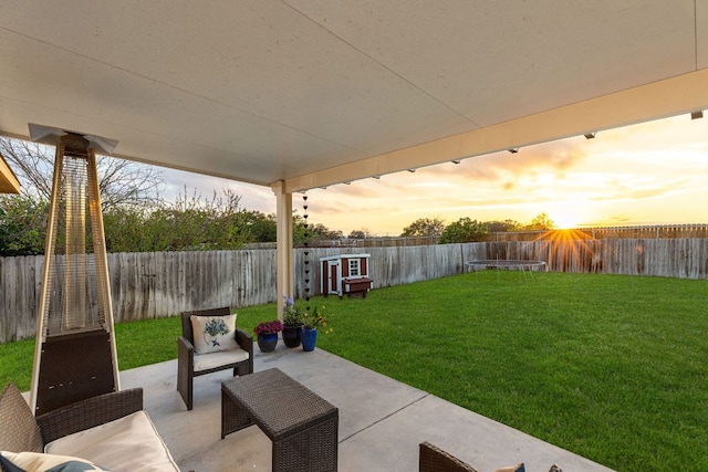 301 Drystone Trl, Liberty Hill, TX 78642 - yard at dusk featuring a patio area