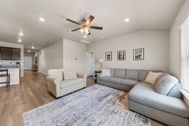 8517 Cantera Ridge Rd, Temple, TX 76502 - living room featuring light wood-style flooring, a ceiling fan, recessed lighting, baseboards, and vaulted ceiling