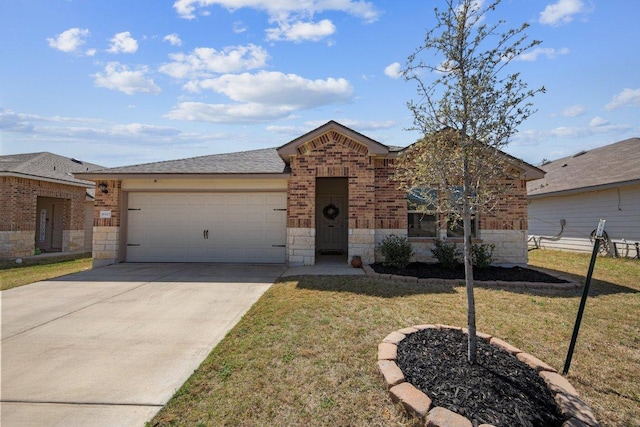 8517 Cantera Ridge Rd, Temple, TX 76502 - view of front facade with brick siding, a garage, a front yard, concrete driveway, and stone siding