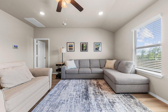 8517 Cantera Ridge Rd, Temple, TX 76502 - living area featuring wood finished floors, ceiling fan, baseboards, recessed lighting, and vaulted ceiling