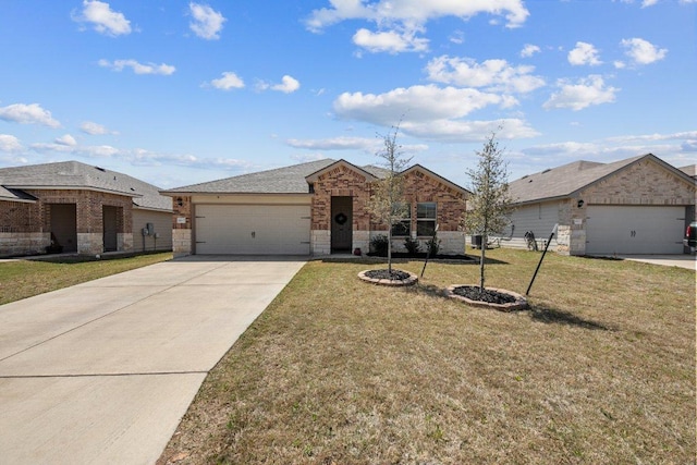 8517 Cantera Ridge Rd, Temple, TX 76502 - ranch-style home with a garage, driveway, brick siding, and a front lawn