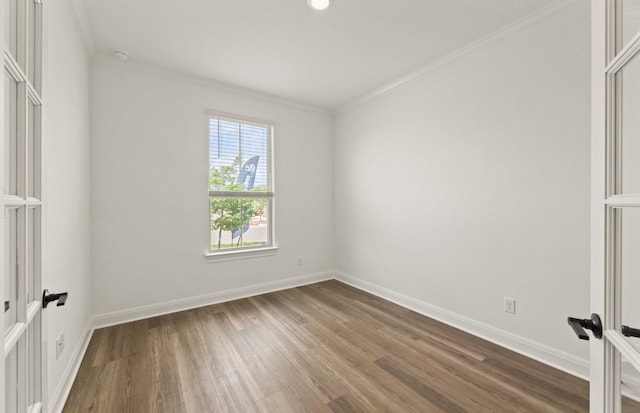 417 Singing Dove Way, Liberty Hill, TX 78642 - empty room featuring dark wood finished floors, ornamental molding, and recessed lighting