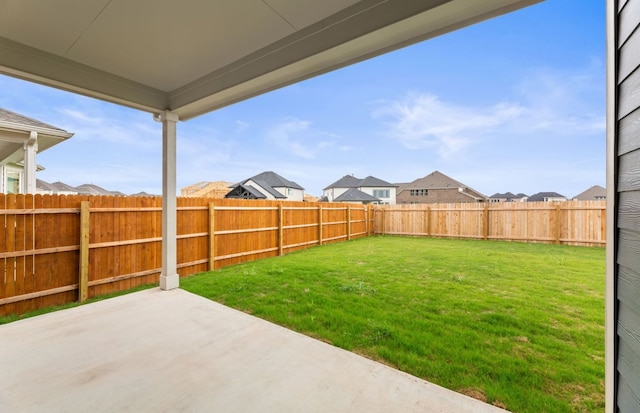 417 Singing Dove Way, Liberty Hill, TX 78642 - fenced backyard with a patio and a residential view