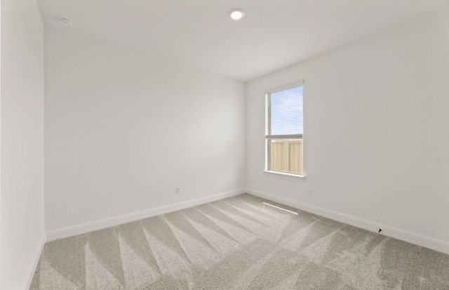 417 Singing Dove Way, Liberty Hill, TX 78642 - unfurnished room with carpet floors, baseboards, recessed lighting, and a smoke detector