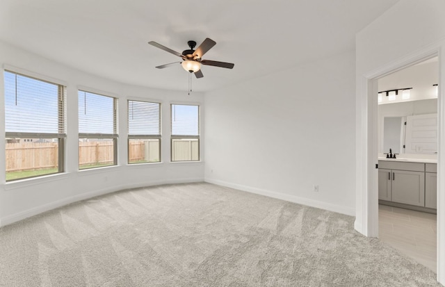417 Singing Dove Way, Liberty Hill, TX 78642 - spare room featuring light colored carpet and ceiling fan