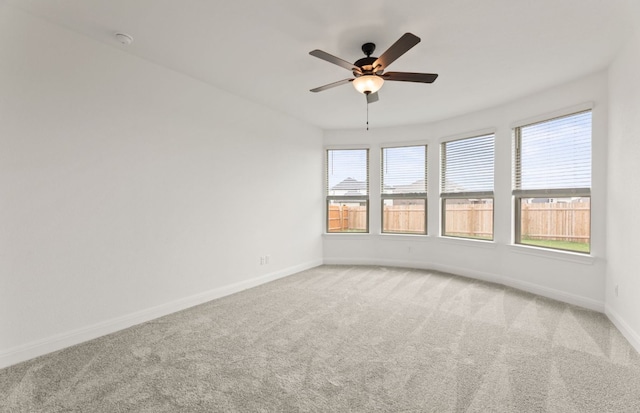417 Singing Dove Way, Liberty Hill, TX 78642 - unfurnished room featuring carpet, a ceiling fan, and a smoke detector