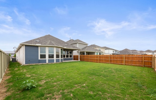 417 Singing Dove Way, Liberty Hill, TX 78642 - rear view of house with a fenced backyard