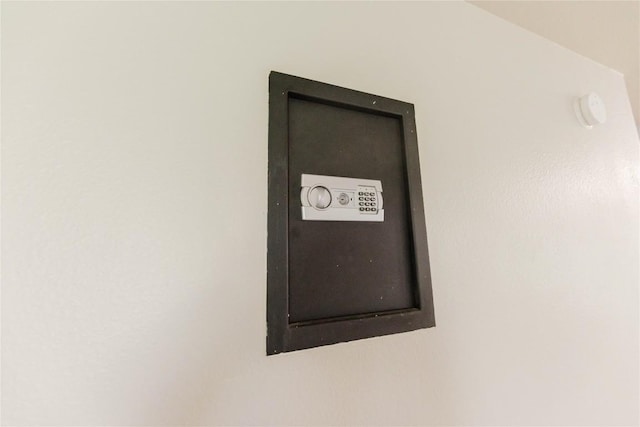 115 Hummingbird Ct, Cedar Creek, TX 78612 - detailed view of electric panel and a smoke detector