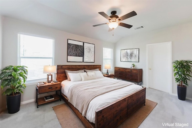 115 Hummingbird Ct, Cedar Creek, TX 78612 - bedroom featuring light carpet, baseboards, ceiling fan, and vaulted ceiling