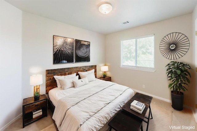 115 Hummingbird Ct, Cedar Creek, TX 78612 - bedroom with light colored carpet and baseboards
