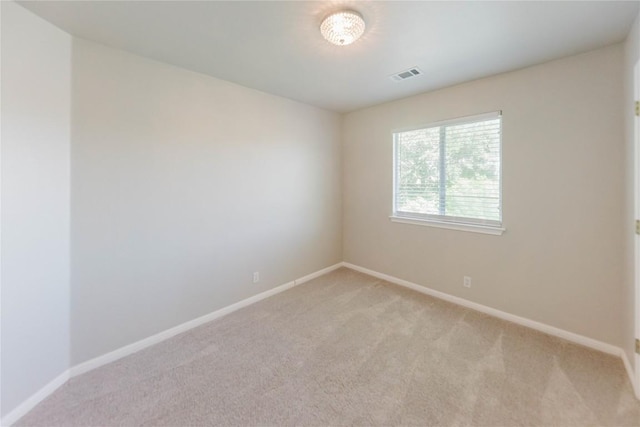 115 Hummingbird Ct, Cedar Creek, TX 78612 - unfurnished room with light colored carpet and baseboards