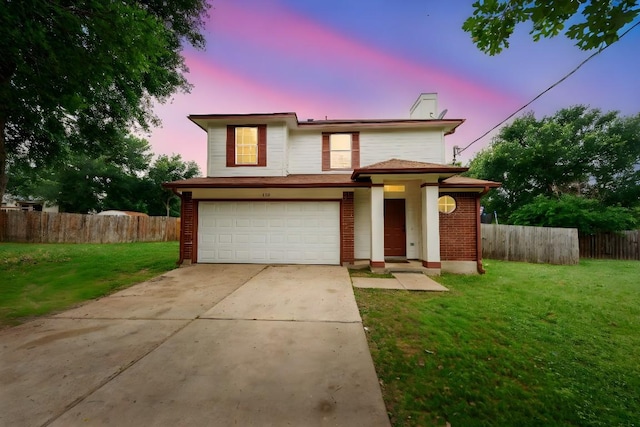 115 Hummingbird Ct, Cedar Creek, TX 78612 - view of front facade with an attached garage, concrete driveway, a chimney, and brick siding