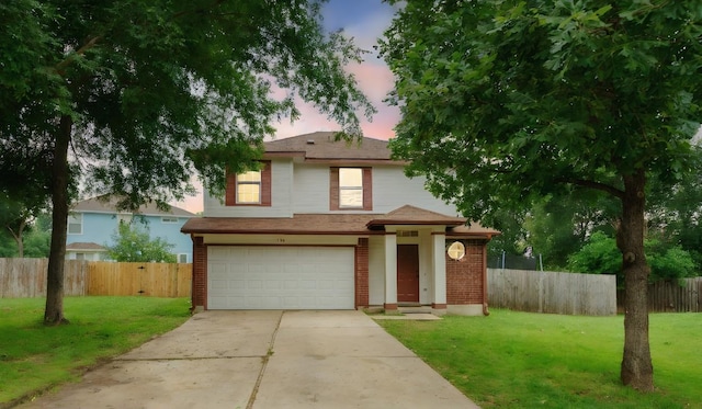 115 Hummingbird Ct, Cedar Creek, TX 78612 - traditional-style home featuring a garage and driveway