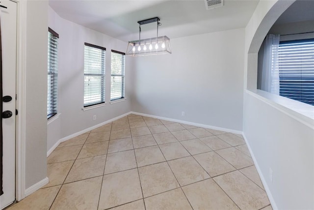 115 Hummingbird Ct, Cedar Creek, TX 78612 - unfurnished dining area featuring light tile patterned floors and baseboards