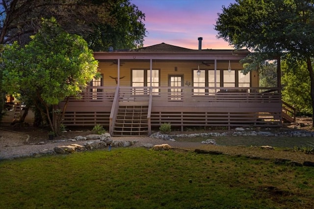 3805 Turkey Creek Dr, Austin, TX 78730 - back of house featuring stairway, a lawn, ceiling fan, and a deck