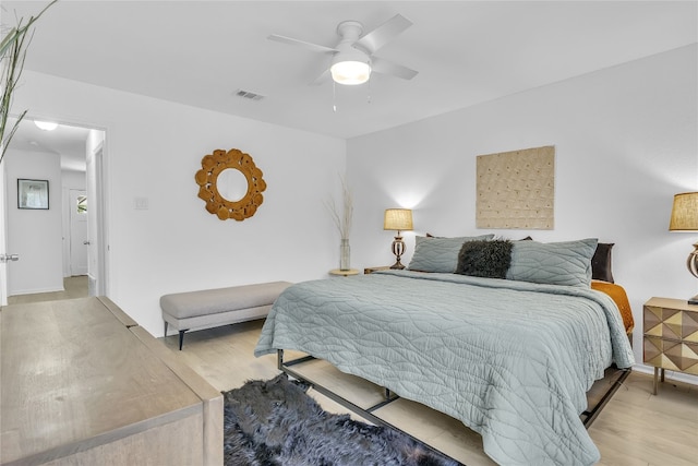9831 Briar Ridge Dr, Austin, TX 78748 - bedroom with wood finished floors and a ceiling fan