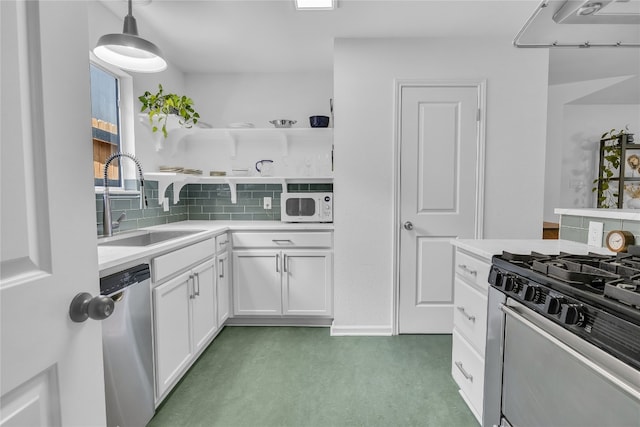 9831 Briar Ridge Dr, Austin, TX 78748 - kitchen featuring dishwasher, stove, white cabinetry, white microwave, and light countertops