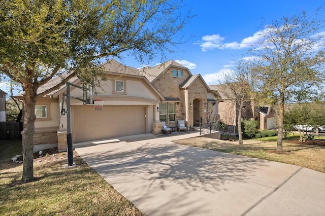 8409 Lookout Cliff Pass, Austin, TX 78737 - traditional home with stone siding, concrete driveway, stucco siding, and a garage