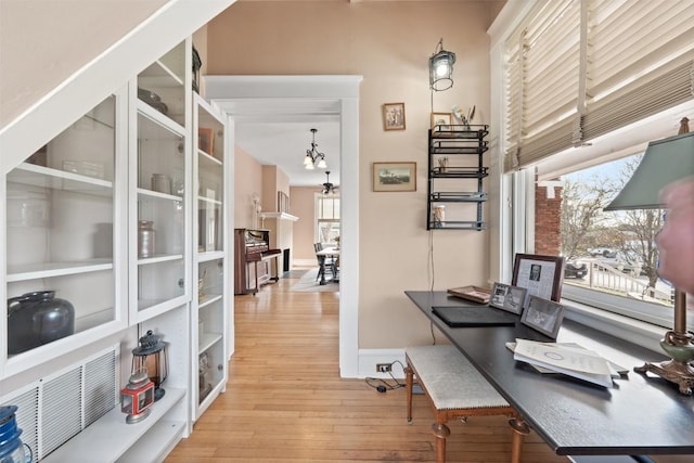 517 N 9th St, Temple, TX 76501 - office area with light wood-type flooring and baseboards
