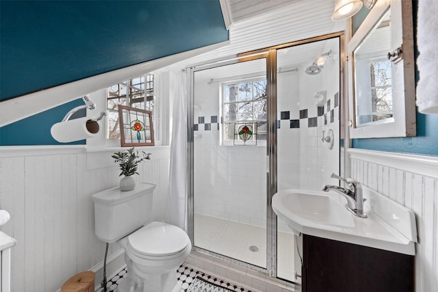517 N 9th St, Temple, TX 76501 - full bathroom featuring wainscoting, a stall shower, tile patterned flooring, vanity, and radiator heating unit