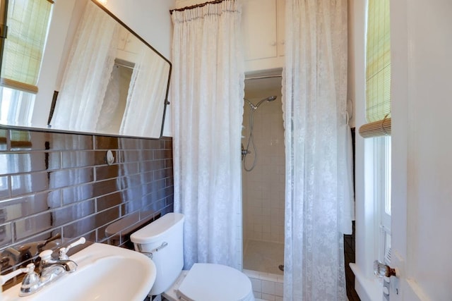 517 N 9th St, Temple, TX 76501 - bathroom with tile walls and a shower stall