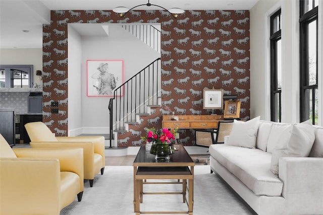 901 Wayside Dr, Austin, TX 78703 - living area featuring wallpapered walls, healthy amount of natural light, and stairs