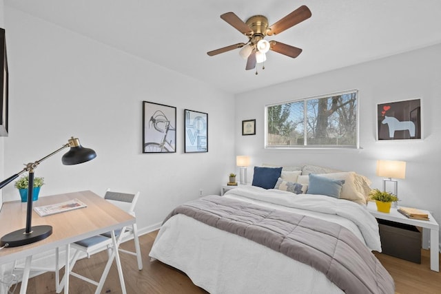 11305 Songbird Cv, Austin, TX 78750 - bedroom with wood finished floors and baseboards