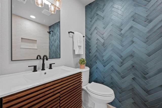 11305 Songbird Cv, Austin, TX 78750 - bathroom featuring vanity and a tile shower