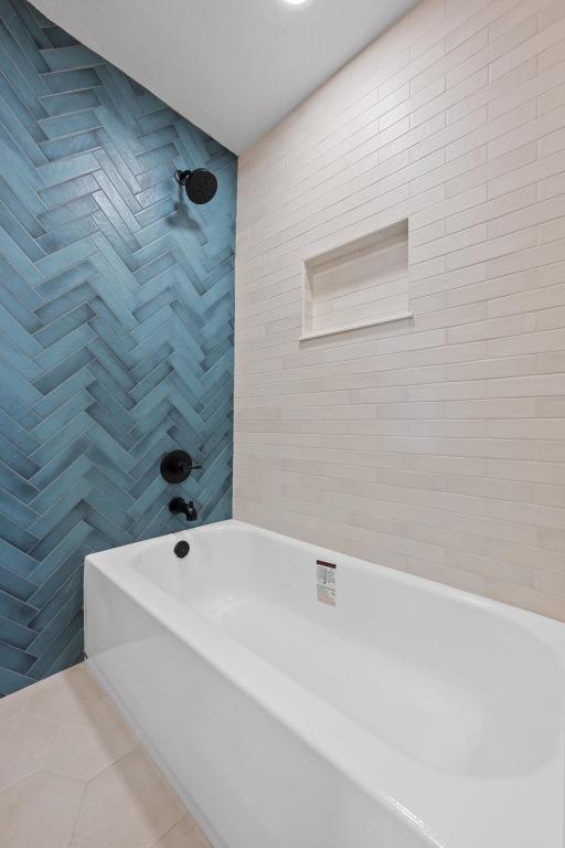 11305 Songbird Cv, Austin, TX 78750 - bathroom featuring shower / washtub combination