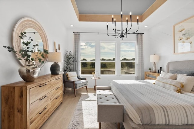 100 Silent Grove Ct, Georgetown, TX 78642 - bedroom featuring a chandelier, light wood-style floors, and recessed lighting