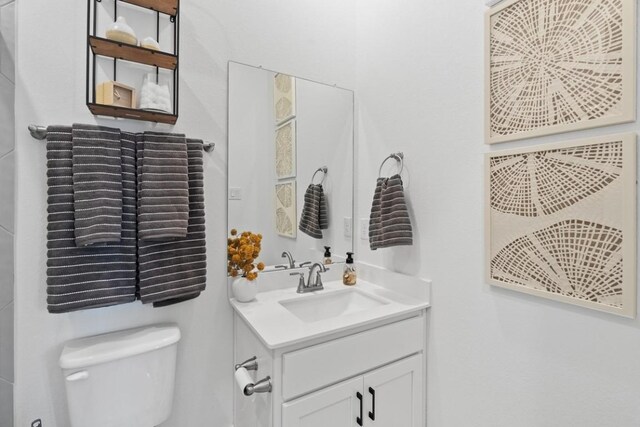 100 Silent Grove Ct, Georgetown, TX 78642 - bathroom featuring vanity and toilet