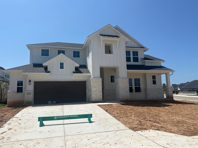 100 Silent Grove Ct, Georgetown, TX 78642 - modern inspired farmhouse with board and batten siding, a shingled roof, driveway, and stone siding