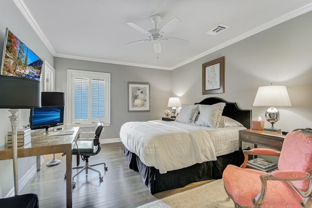 1304 Gaston Ave, Austin, TX 78703 - bedroom with ornamental molding, wood finished floors, a desk, baseboards, and ceiling fan